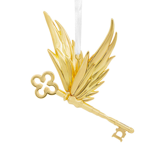 Hallmark Christmas Ornament (Harry Potter Winged Key Premium Metal) in shiny metallic gold with winged detail, hanging design.