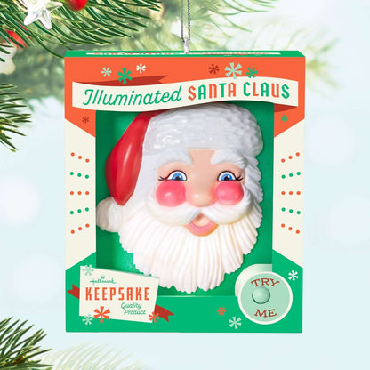 Holly Jolly Santa — 2025 Hallmark Keepsake Christmas Ornament, retro Santa face in gift box, illuminated design with rosy cheeks, 6.99 x 8.26 x 2.54 cm