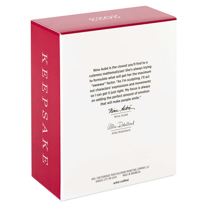 Baby's 1st Christmas (2023) photo frame — Hallmark Keepsake Christmas ornament packaging detail with artist information and 2023 date.
