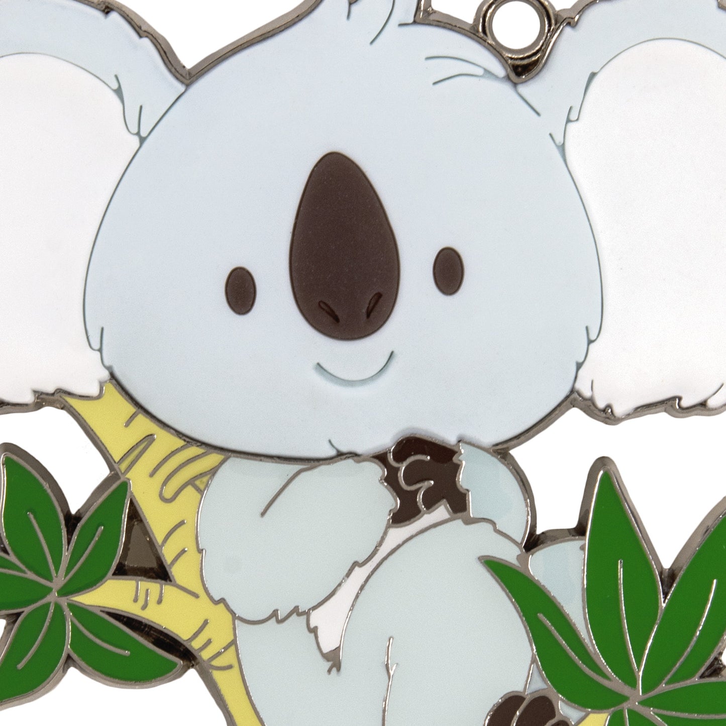 Hallmark Christmas Ornament - Koala Bear With Dimension Metal, close-up view of the cute koala with a smile, sitting on a branch.