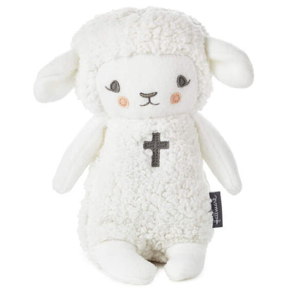 Lullaby Lamb Musical Stuffed Animal, 8.25" in soft white plush with embroidered cross detail, front view.
