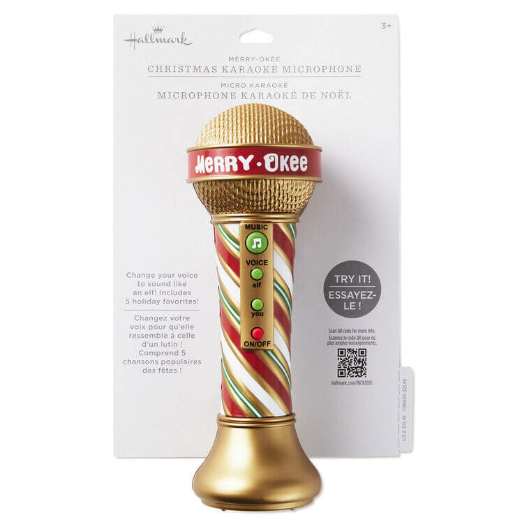 Merry-Okee Christmas Interactive Microphone with festive design, gold base, and packaging details for holiday fun.