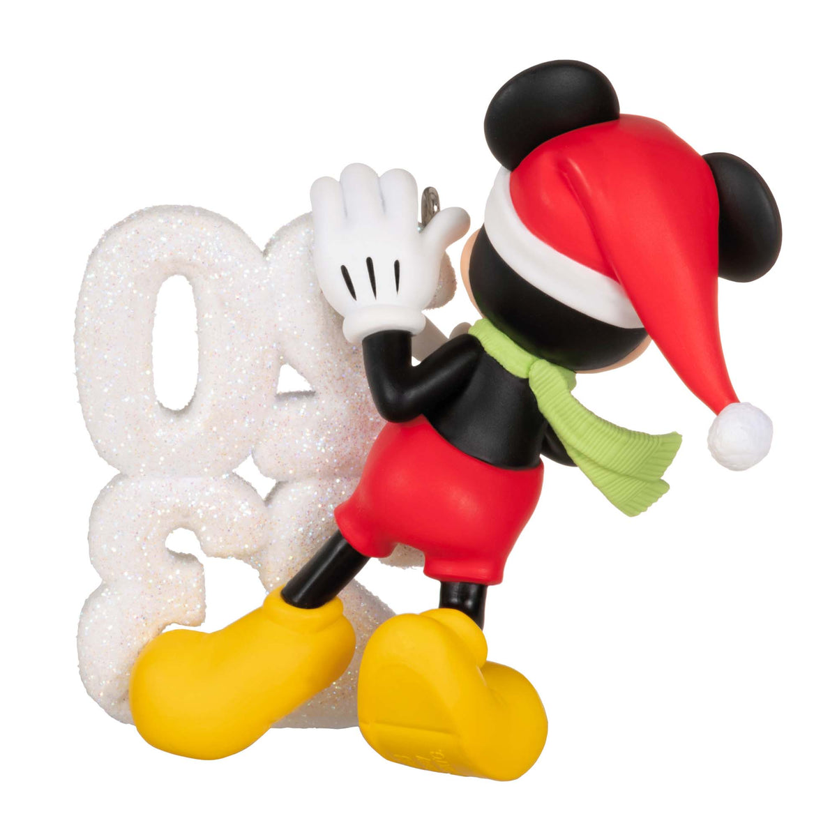 Disney Mickey Mouse, A Year of Disney Magic — Hallmark Keepsake Christmas Ornament with snow sculpture and festive attire, angled view.