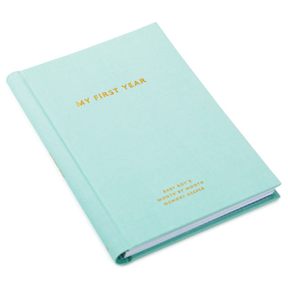 My First Year Baby Book - Blue, hardcover journal with gold lettering, angled view highlighting cover detail