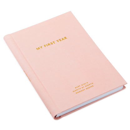 My First Year Baby Book - Pink, soft fabric cover with gold lettering, showcasing the front view of the keepsake book.