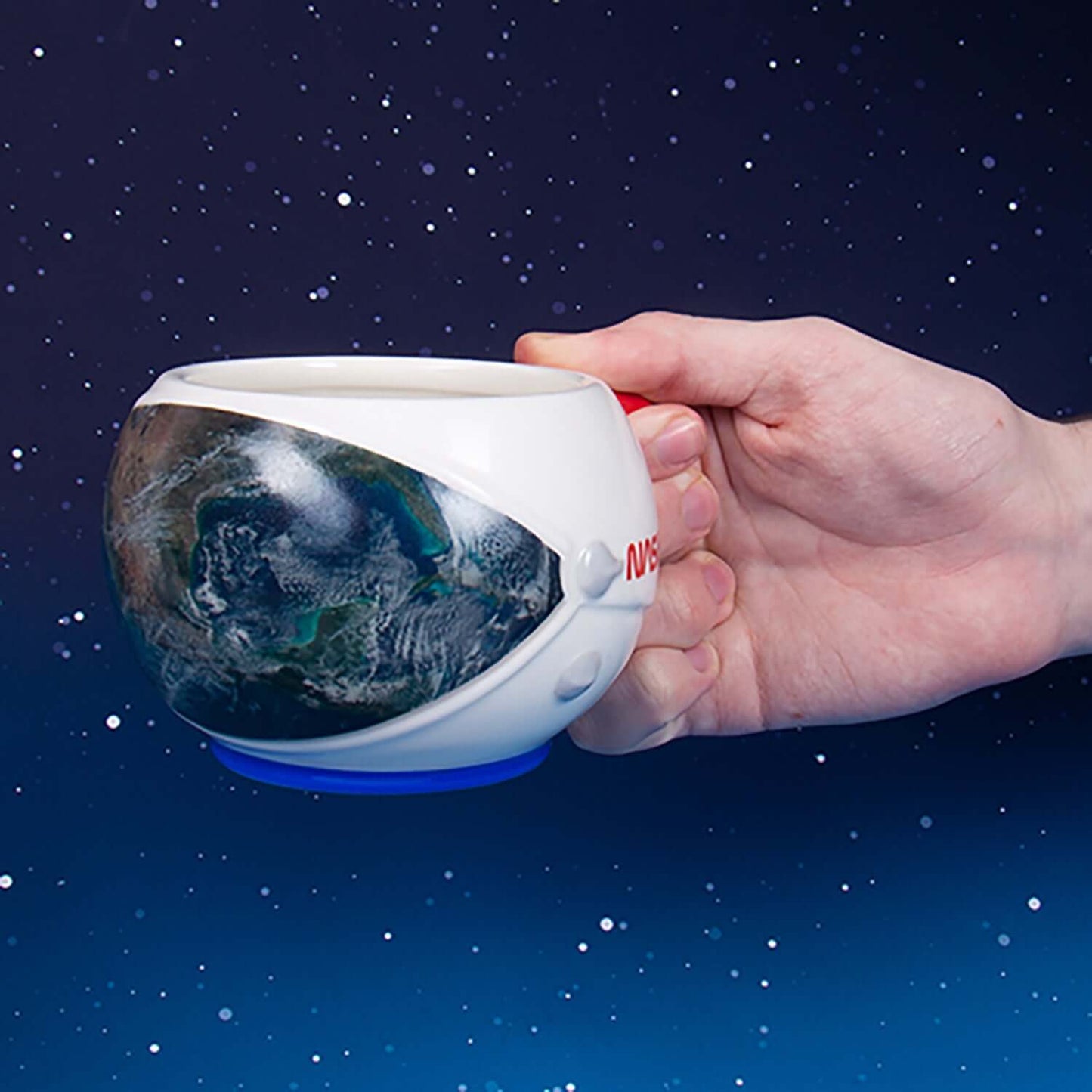 NASA Heat Change Shaped Mug with 3D embossed design held in hand, featuring Earth image and astronaut helmet styling.