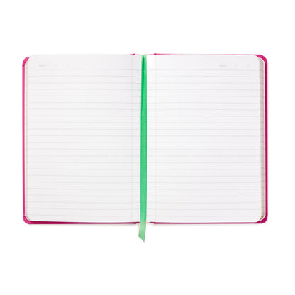 Next Chapter Notebook with lined pages, fuchsia cover and green ribbon bookmark showcasing the interior design.