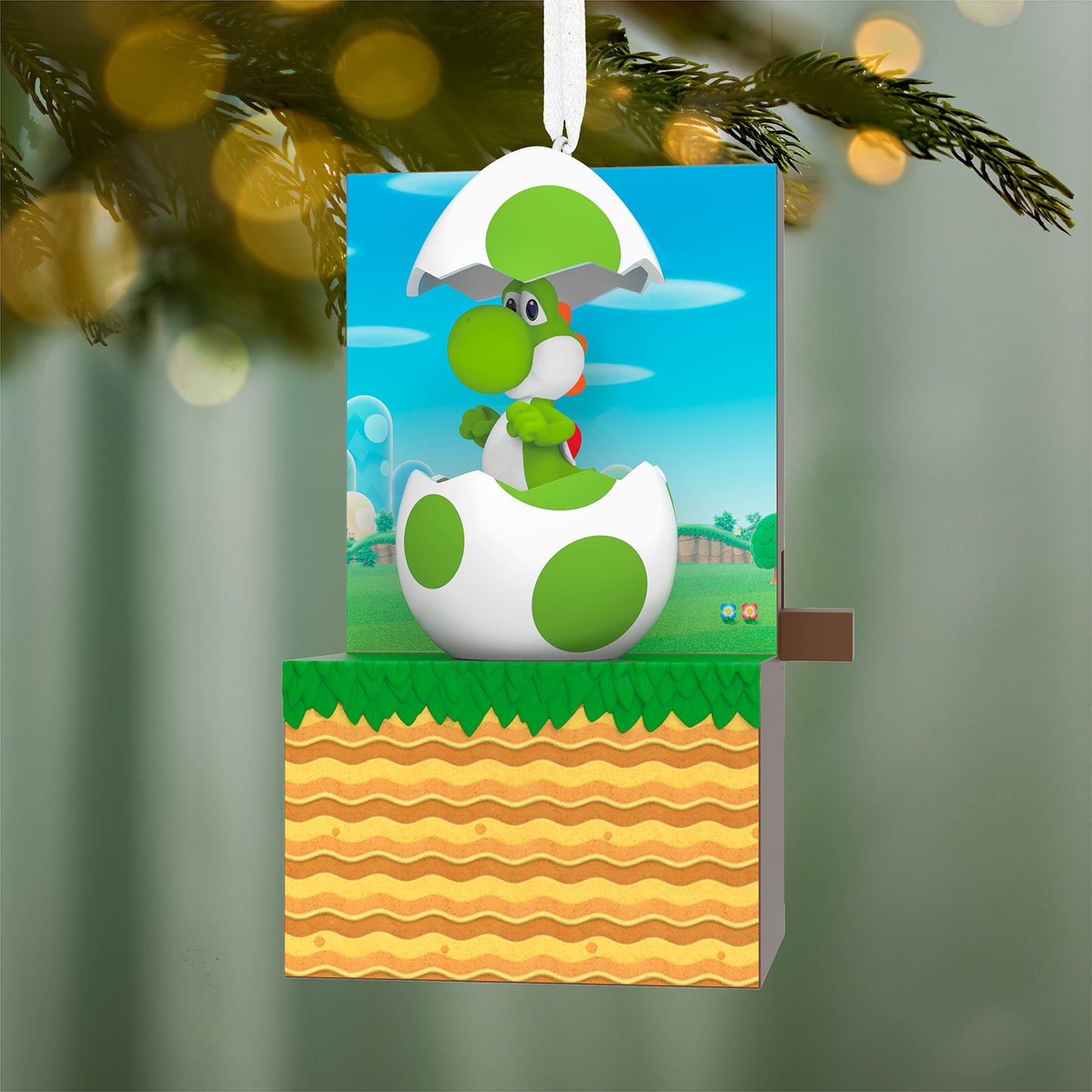 Nintendo Super Mario It's Yoshi! With Sound and Motion — 2026 Hallmark Keepsake Christmas Ornament, detailed view of Yoshi emerging from egg.