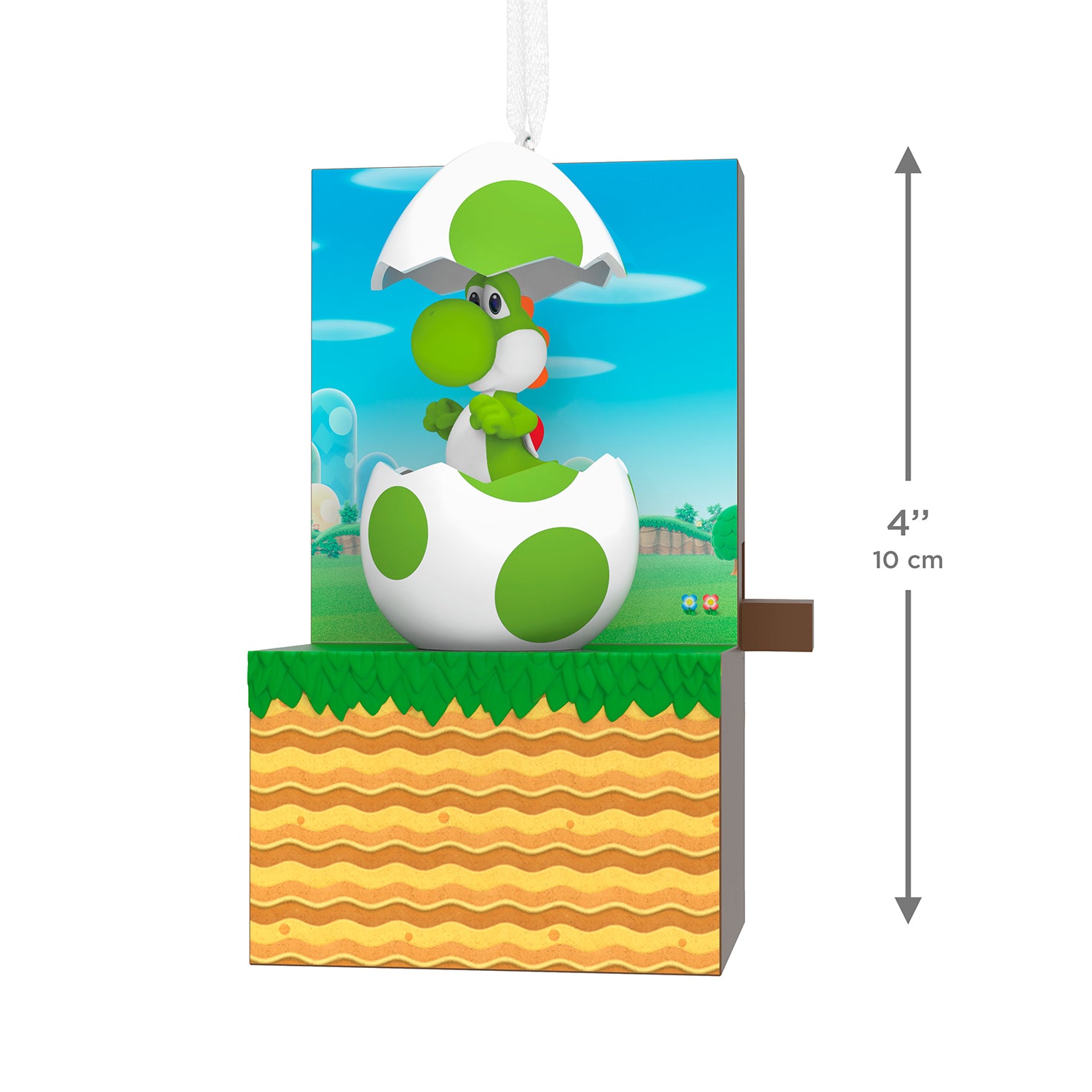 Nintendo Super Mario It's Yoshi! With Sound and Motion — 2026 Hallmark Keepsake Christmas Ornament, angled view of Yoshi hatching from egg against colourful landscape.