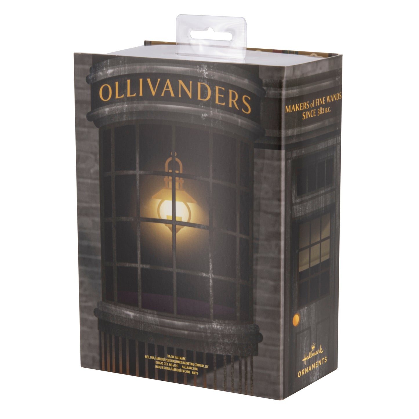 Hallmark Christmas Ornaments - Harry Potter and Ollivander, Set of 2 packaging box featuring Ollivander's shop window design.