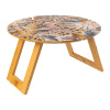 Picnic Leopard Foldable Picnic Table with a vibrant patterned surface and sturdy wooden legs, angled view for detail.