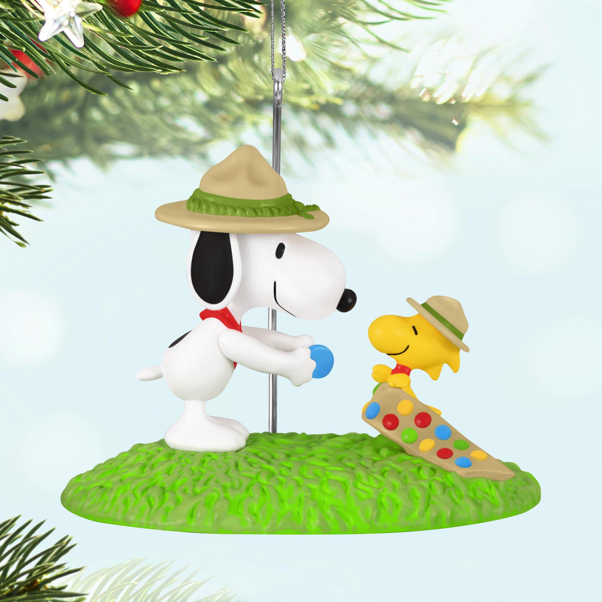 Peanuts® Merit Badge Ceremony — 2025 Hallmark Keepsake Christmas Ornament featuring Scoutmaster Snoopy and Woodstock on a grassy base, detailed design.