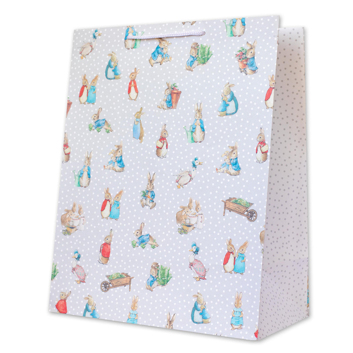 Hallmark Large Gift Bag & Card Bundle - Peter Rabbit featuring a playful design of rabbits in various outfits on grey background with polka dots.