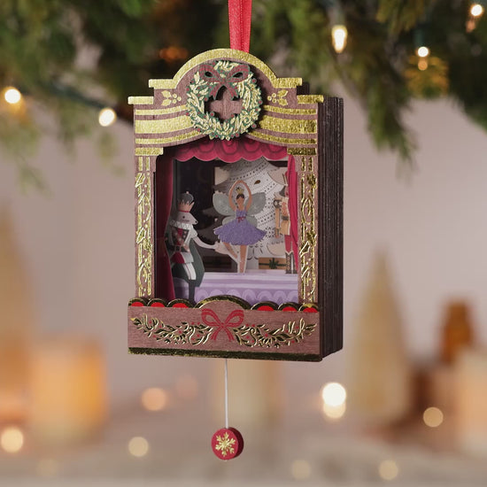 The Nutcracker Ballet Musical With Motion, Papercraft — 2026 Hallmark Keepsake Christmas Ornament, featuring a stage scene with a dancing ballerina and the Mouse King.