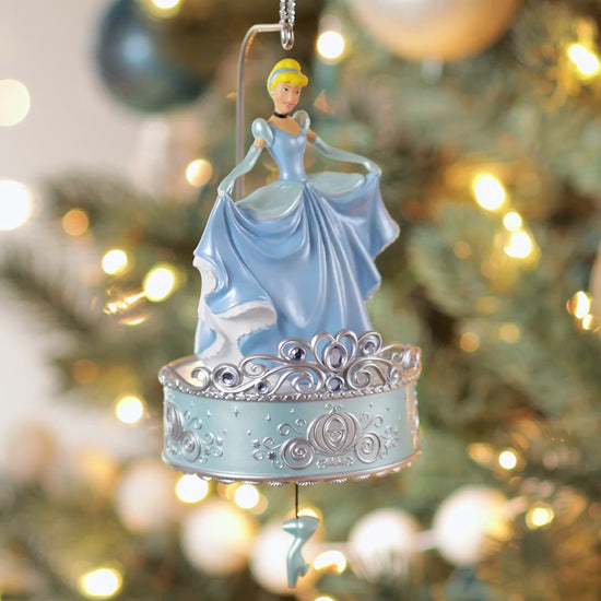 Disney Cinderella, Twirling at the Ball — Hallmark Keepsake Christmas Ornament featuring Cinderella in a blue gown, twirling above a decorative base.