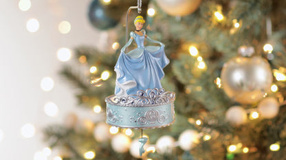 Disney Cinderella, Twirling at the Ball — Hallmark Keepsake Christmas Ornament featuring Cinderella in a blue gown, twirling above a decorative base.