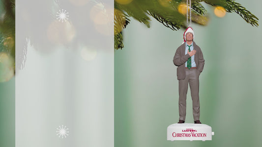 National Lampoon's Christmas Vacation™ Clark Griswold With Sound — 2026 Hallmark Keepsake Christmas Ornament hanging on a tree branch.