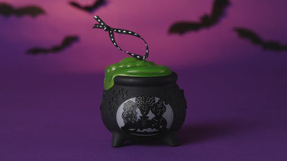 Disney Hocus Pocus Sanderson Sisters cauldron with light — 2026 Hallmark Keepsake Halloween ornament featuring a green filling and black design.