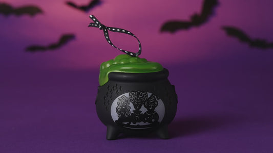 Disney Hocus Pocus Sanderson Sisters cauldron with light — 2026 Hallmark Keepsake Halloween ornament featuring a green filling and black design.