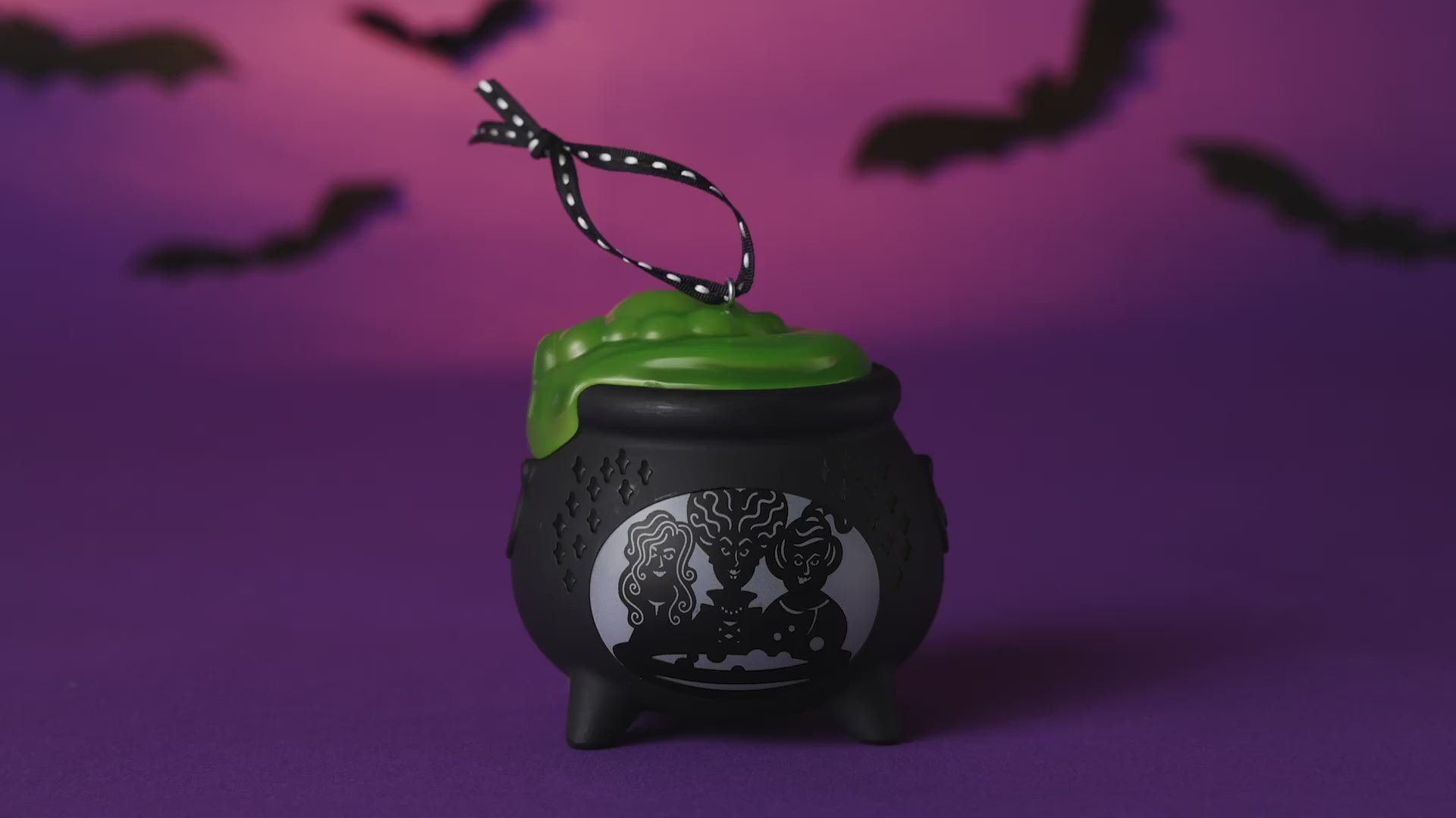 Disney Hocus Pocus Sanderson Sisters cauldron with light — 2026 Hallmark Keepsake Halloween ornament featuring a green filling and black design.