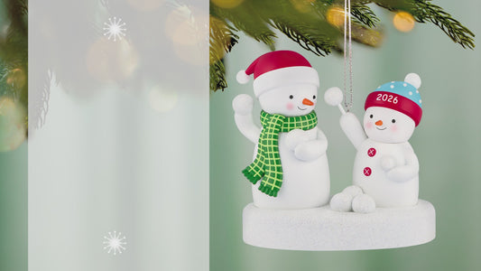 Snowball Fight 2026 Musical — 2026 Hallmark Keepsake Christmas Ornament featuring two playful snowmen in winter hats, captured during a snowball fight.