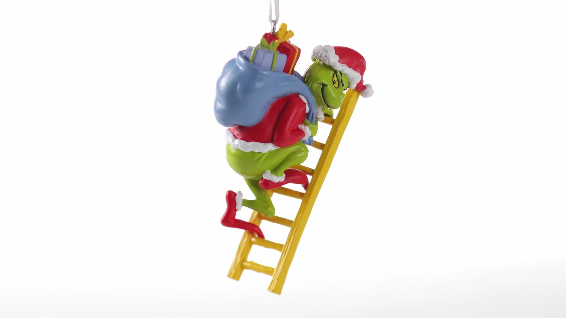 Hallmark Christmas Ornament - Dr. Seuss's How the Grinch Stole Christmas! features the Grinch on a ladder with stolen presents.