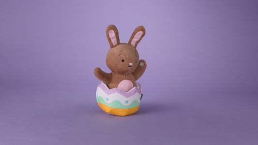 Excited for Eggs Bunny Plush With Sound and Motion in colourful egg shell, showcasing adorable features and soft fur.
