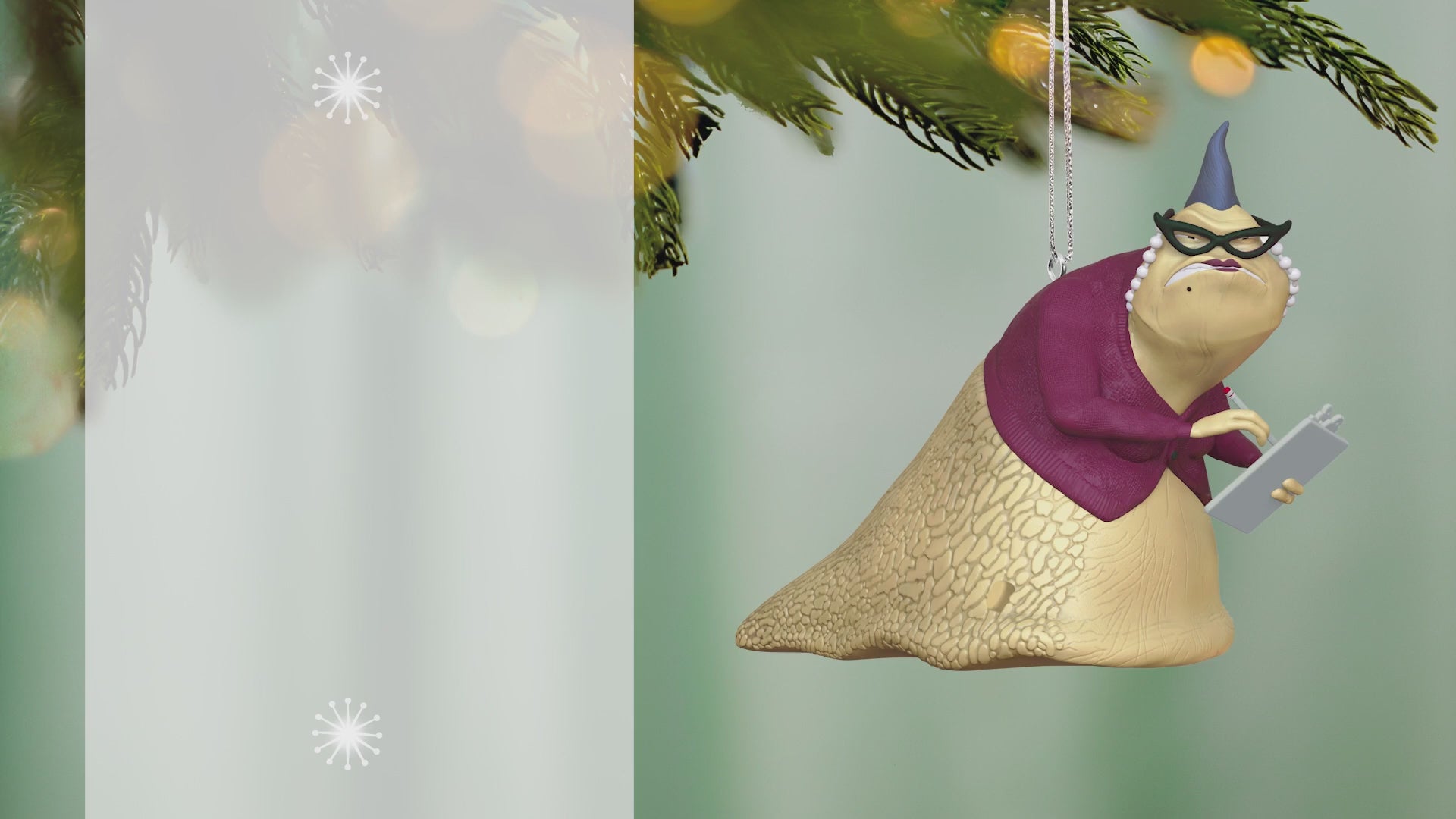 Disney/Pixar Monsters, Inc. Roz With Sound — 2026 Hallmark Keepsake Christmas Ornament hanging from a Christmas tree with a blurred background.