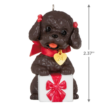Puppy Love Poodle — Hallmark Keepsake Christmas Ornament, black poodle with red bows, sitting on a gift, 2.37 inches tall.