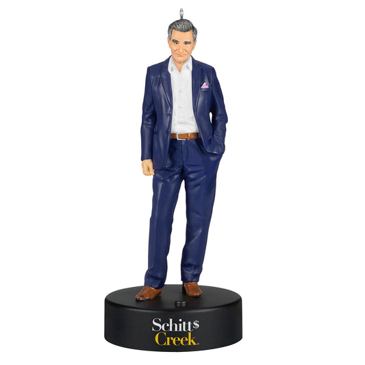 Schitt's Creek® Johnny Rose With Sound — 2026 Hallmark Keepsake Christmas Ornament in navy suit with jaunty pocket square on a display base