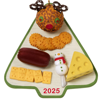 Season's Treatings, 17th in the Series — 2025 Hallmark Keepsake Christmas Ornament, charcuterie board, reindeer cheese ball detail, flat lay view.