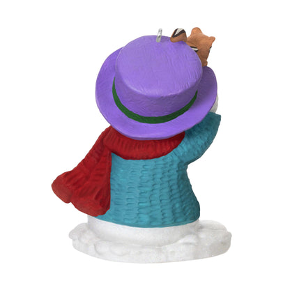 Snow Buddies, 28th in the Series — 2025 Hallmark Keepsake Christmas Ornament, colourful snowman in blue sweater and purple hat, rear view.