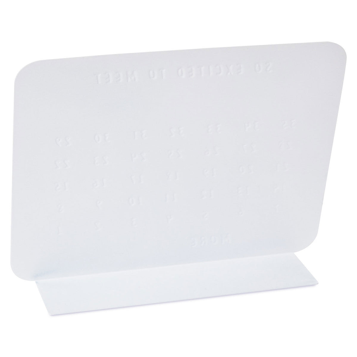 So Excited to Meet You Magnetic Baby Countdown Board in white metal, angled view showing printed number grid.