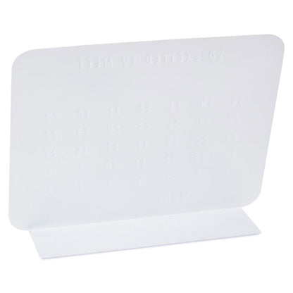 So Excited to Meet You Magnetic Baby Countdown Board in white metal, angled view showing printed number grid.