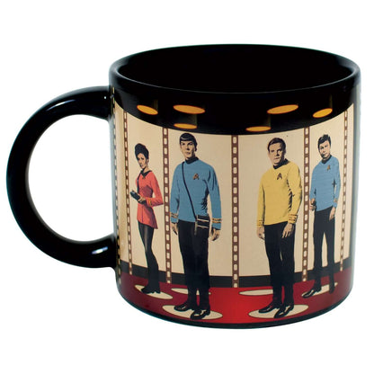 Unemployed Philosophers Guild - Star Trek Transporter Mug features Captain Kirk, Spock, Uhura, and McCoy against a transporter backdrop, angled view.
