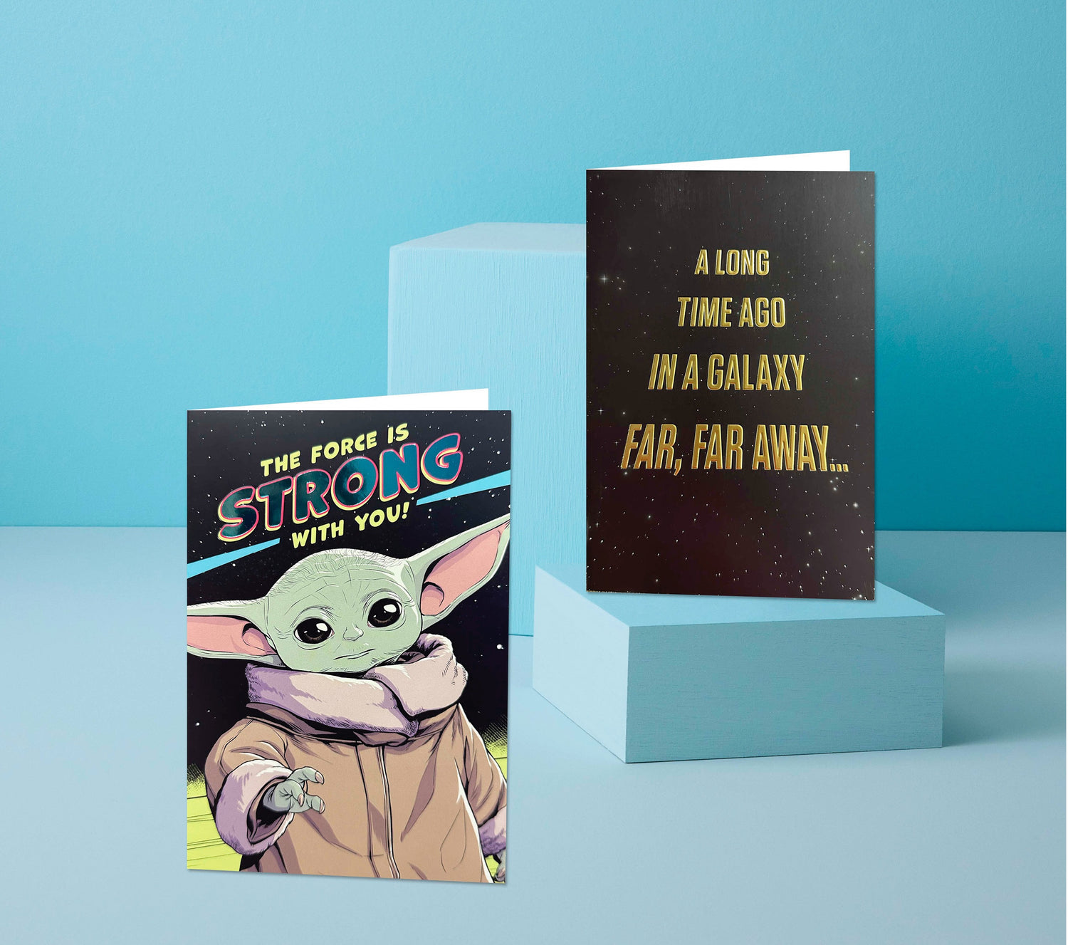 Star Wars greeting cards featuring Yoda and iconic quotes, displayed on light blue blocks with a modern aesthetic.