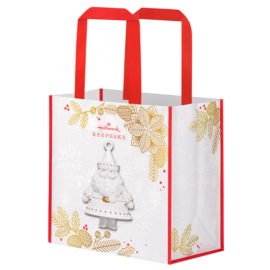 Stunning Santas Reusable — 2026 Hallmark 13.75" Christmas Tote Bag featuring white Santa ornament design and gold floral accents.
