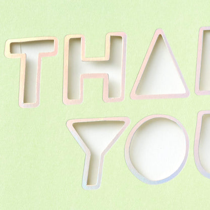 Hallmark Crayola Coloring Cards Assortment, 8 Cards with Envelopes and Markers showcasing die-cut 'thank you' letters on pastel green background.