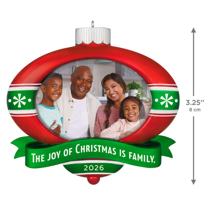 The Joy of Christmas 2026 Photo Frame — 2026 Hallmark Keepsake Christmas Ornament in red and green with a family photo.
