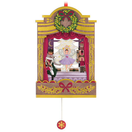 The Nutcracker Ballet Musical With Motion, Papercraft — 2026 Hallmark Keepsake Christmas Ornament featuring a ballerina and nutcracker soldiers in a decorative stage setting.