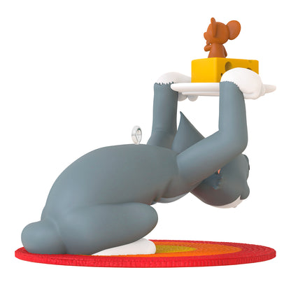 Tom and Jerry™ Hide and Seek — 2026 Hallmark Keepsake Christmas Ornament features Tom searching for Jerry beneath a plate while on a vibrant rug.