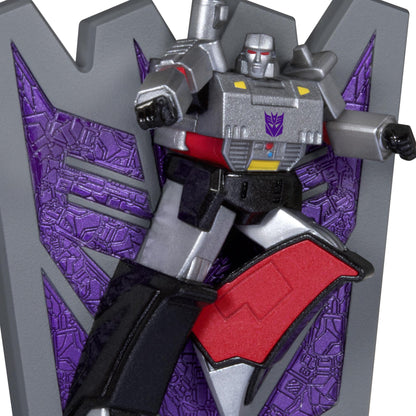 Transformers™, Megatron's Might — 2025 Hallmark Keepsake Christmas Ornament in action pose with detailed grey and purple Decepticon shield.