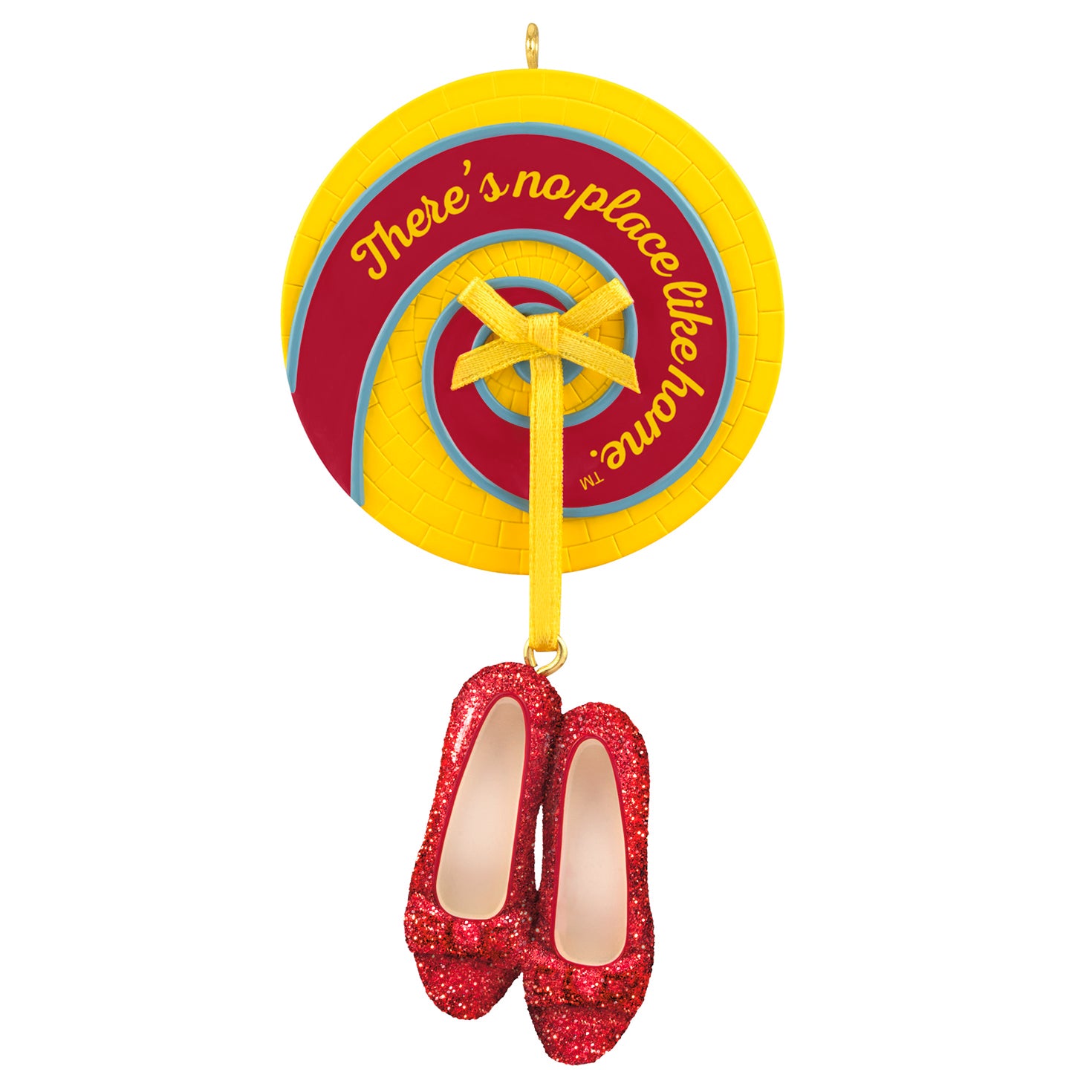 The Wizard of Oz™ Ruby Slippers — 2026 Hallmark Keepsake Christmas Ornament featuring glittery red shoes and a yellow medallion with text.