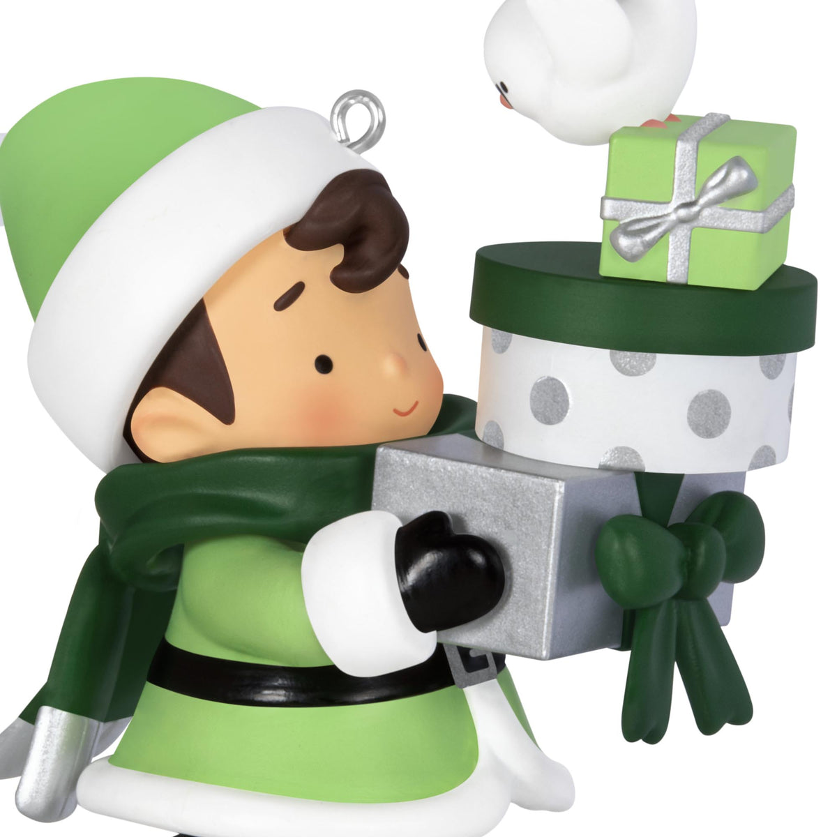2025 Young Santa Surprise Box — 2025 Hallmark Keepsake Christmas Ornament featuring a young Santa in green holding a gift with a bird.