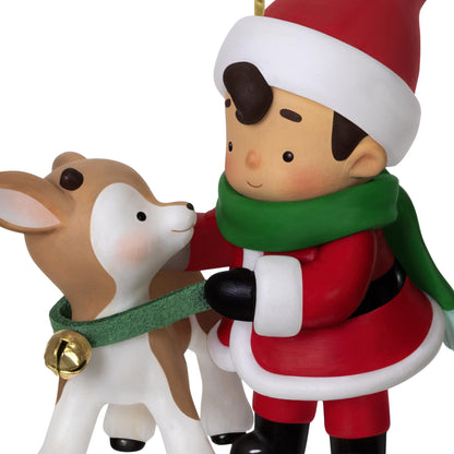 Young Santa, 4th in the Series — 2025 Hallmark Keepsake Christmas Ornament featuring a young Santa boy with a reindeer, close-up view.