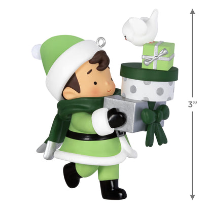 2025 Young Santa Surprise Box — 2025 Hallmark Keepsake Christmas Ornament featuring a young Santa in green holding gift boxes and a bird, 7.6 cm tall.