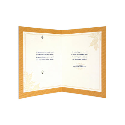 Hallmark Father's Day Card - "Celebrating You, Dad" featuring an inside message with decorative border and floral detail.