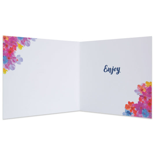 Stylish Cake Floral Birthday Card interior showing vibrant watercolour flowers and the message: 'Enjoy', flat lay view.