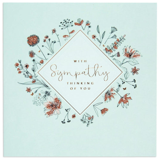 Thinking of Elegant You Sympathy Card on soft baby blue background with floral illustrations and rose gold foil details.