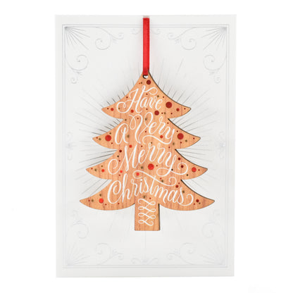 Hallmark Christmas card - Signature Ornament features a decorative wood style Christmas tree ornament with intricate lettering.